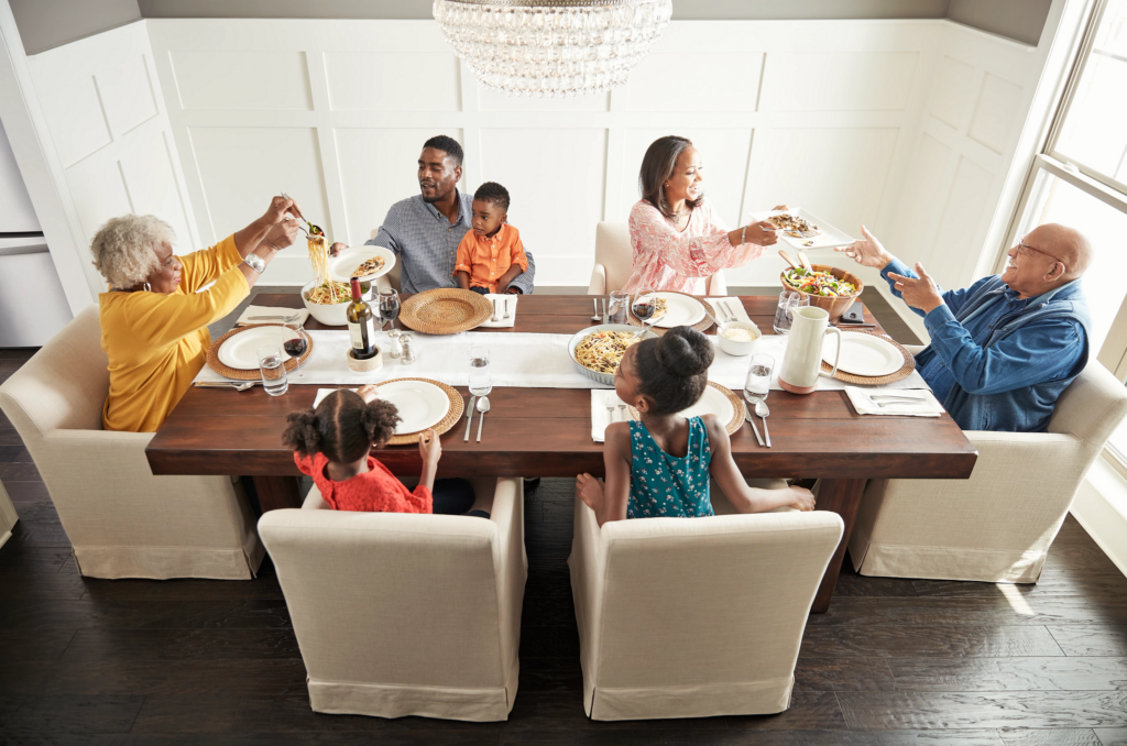 Family enjoying dinner | Havertown Carpet